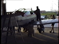 John Murphy's Emeraude  with fuselage on wings in hangar, looking W